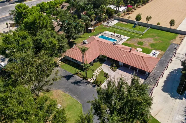 a view of a swimming pool with a slide and a slide
