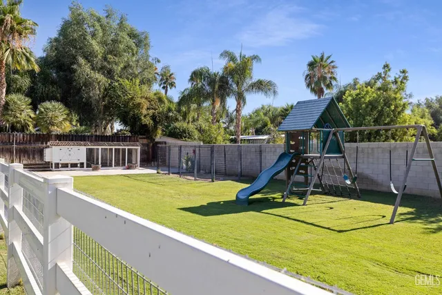 a view of swimming pool with chairs