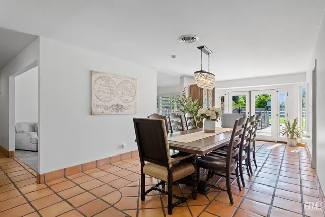 a living room with furniture gym equipment and a fireplace