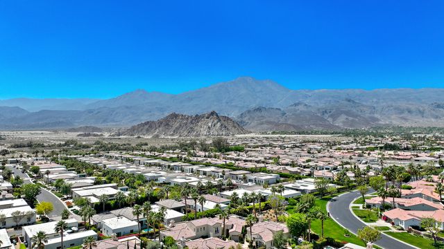 a view of a city with a lake