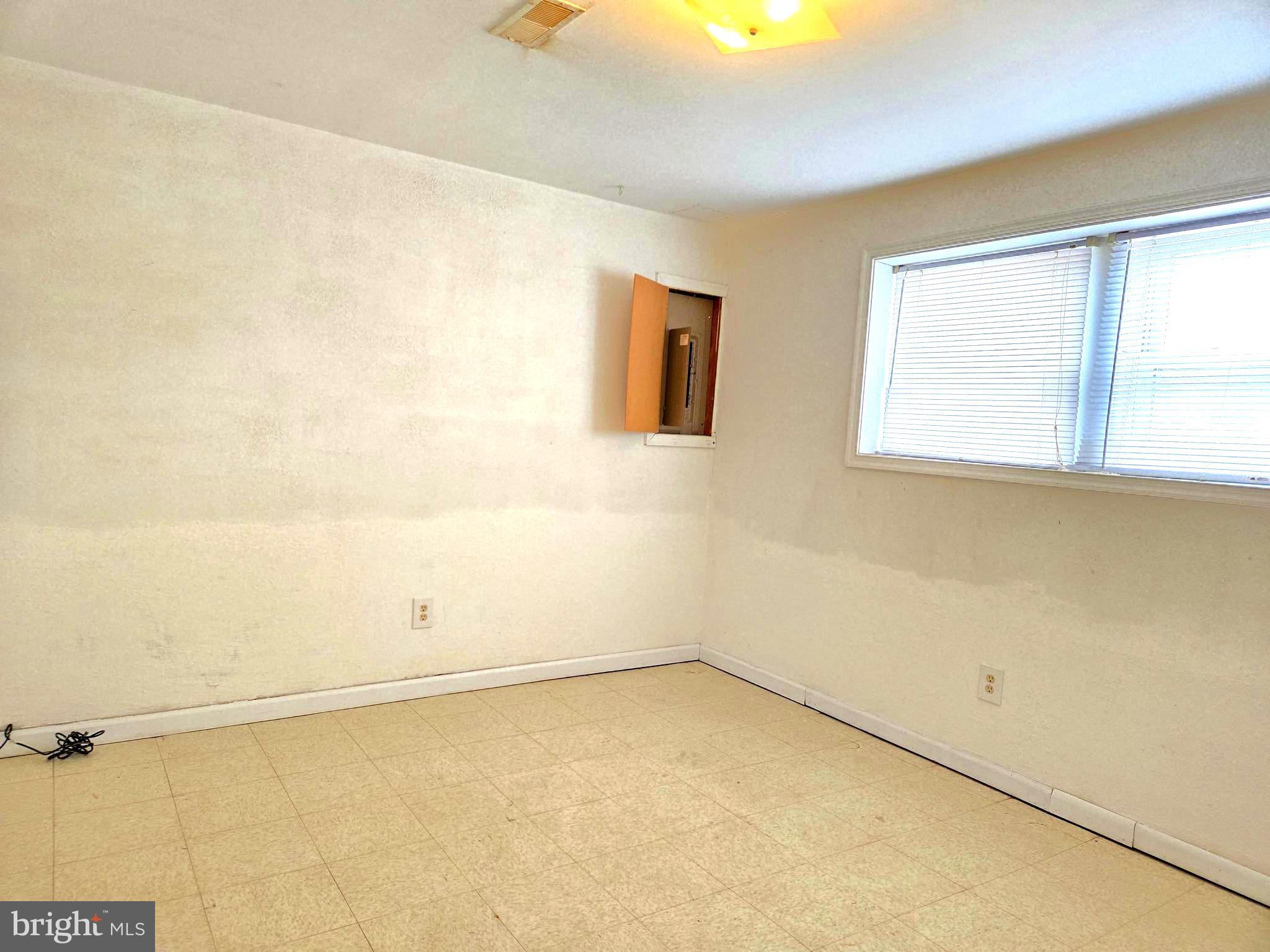 1630 Liberty Grove Road Conowingo, MD 21918 - Photo 11 of 18 an empty room with a window