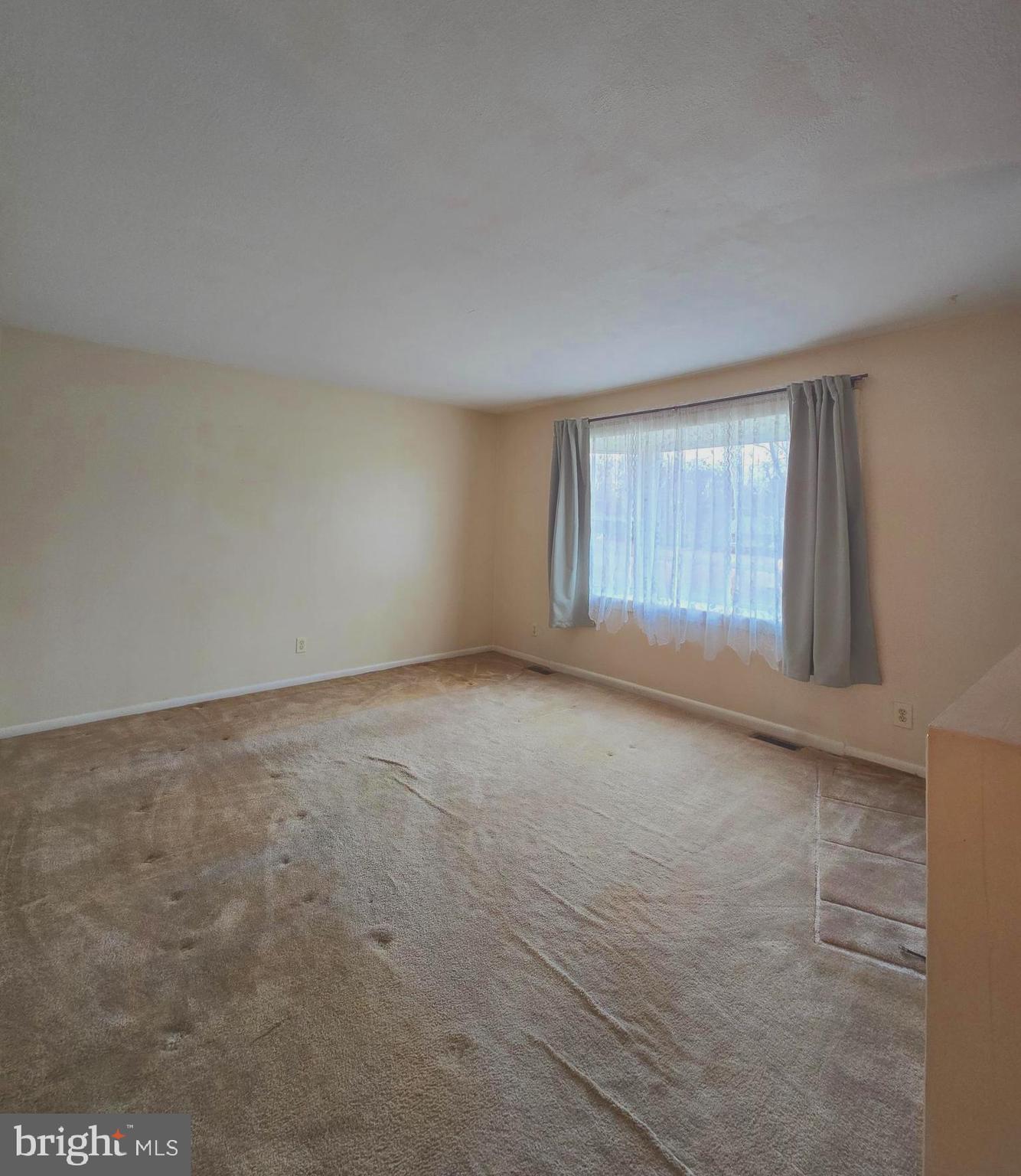 1630 Liberty Grove Road Conowingo, MD 21918 - Photo 4 of 18 an empty room with a empty space and windows