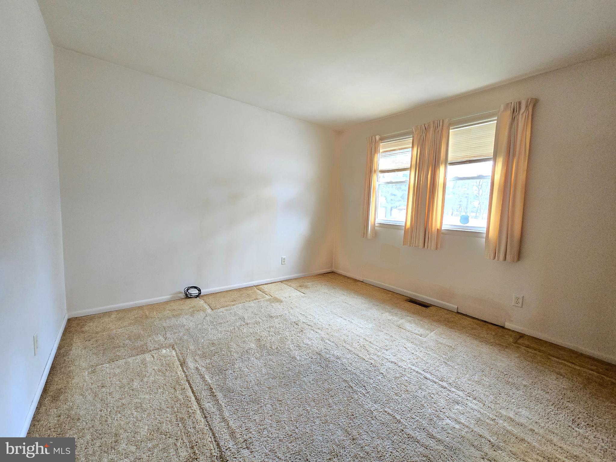 1630 Liberty Grove Road Conowingo, MD 21918 - Photo 8 of 18 an empty room with windows