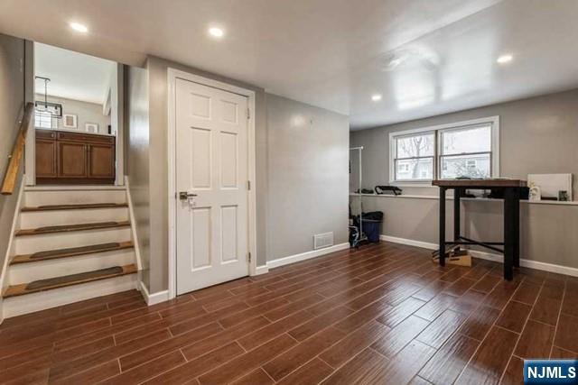 23 Asmus Road Closter, NJ 07624 - Photo 23 of 38 a view of a workspace with wooden floor and a window