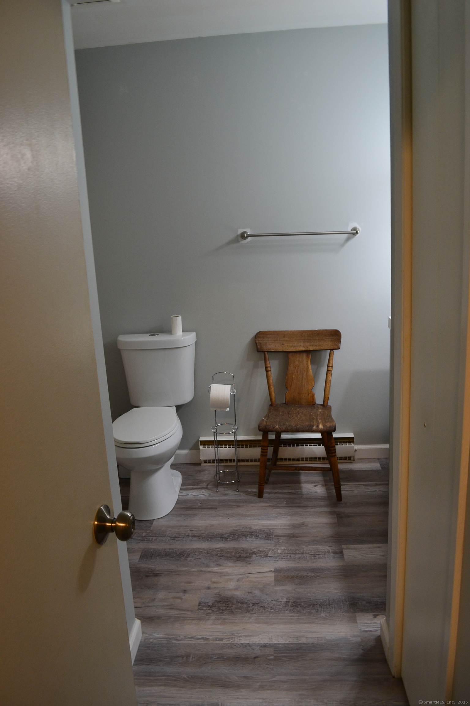 41 Mountain Laurel Court, Unit 41 Cromwell, CT 06416 - Photo 13 of 16 a bathroom with a toilet and a mirror
