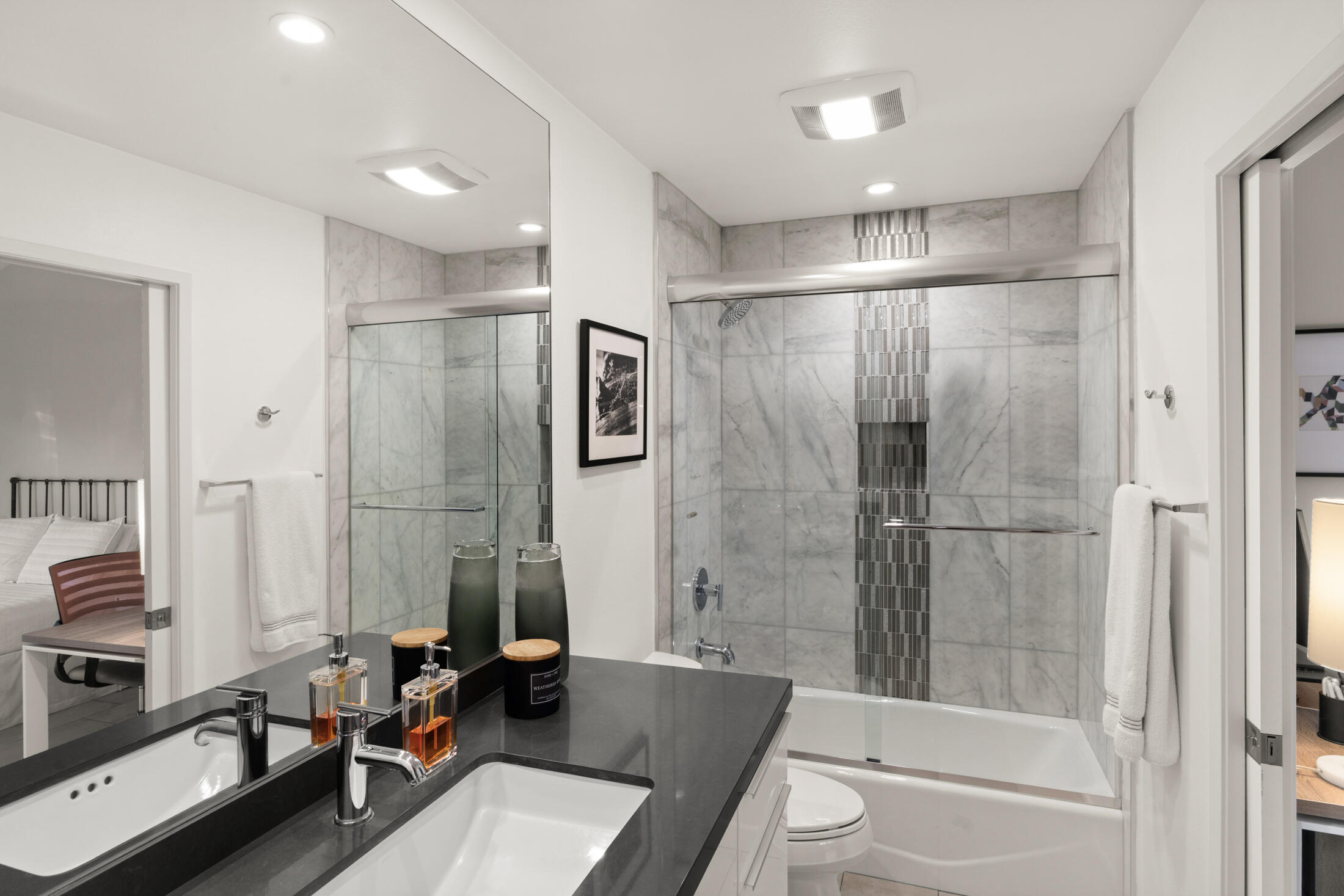 6155 East Driver Road Palm Springs, CA 92264 - Photo 13 of 22 a bathroom with a tub shower vanity and a sink