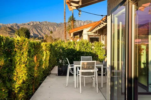 a view of a porch with a bench
