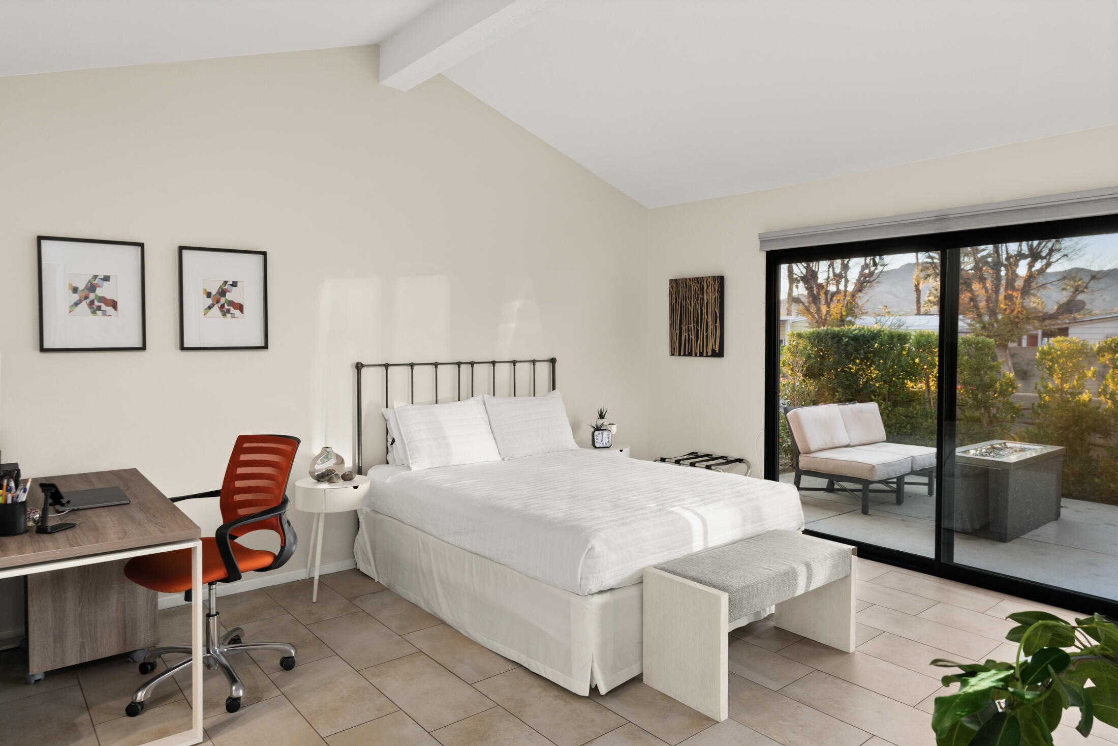 6155 East Driver Road Palm Springs, CA 92264 - Photo 9 of 22 a bedroom with a bed and a large window