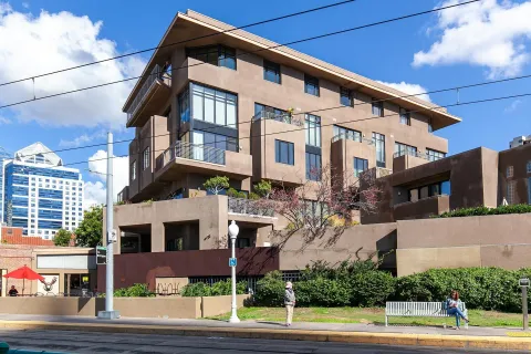 a view of a city with tall buildings