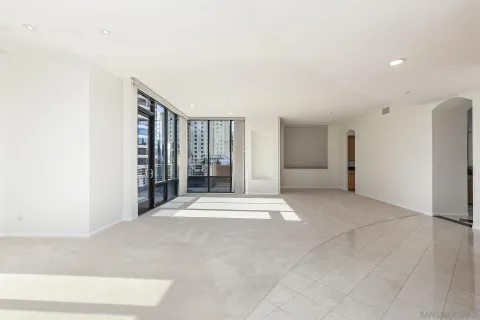 a view of a kitchen with furniture and a window