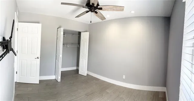 a view of a room with a large window