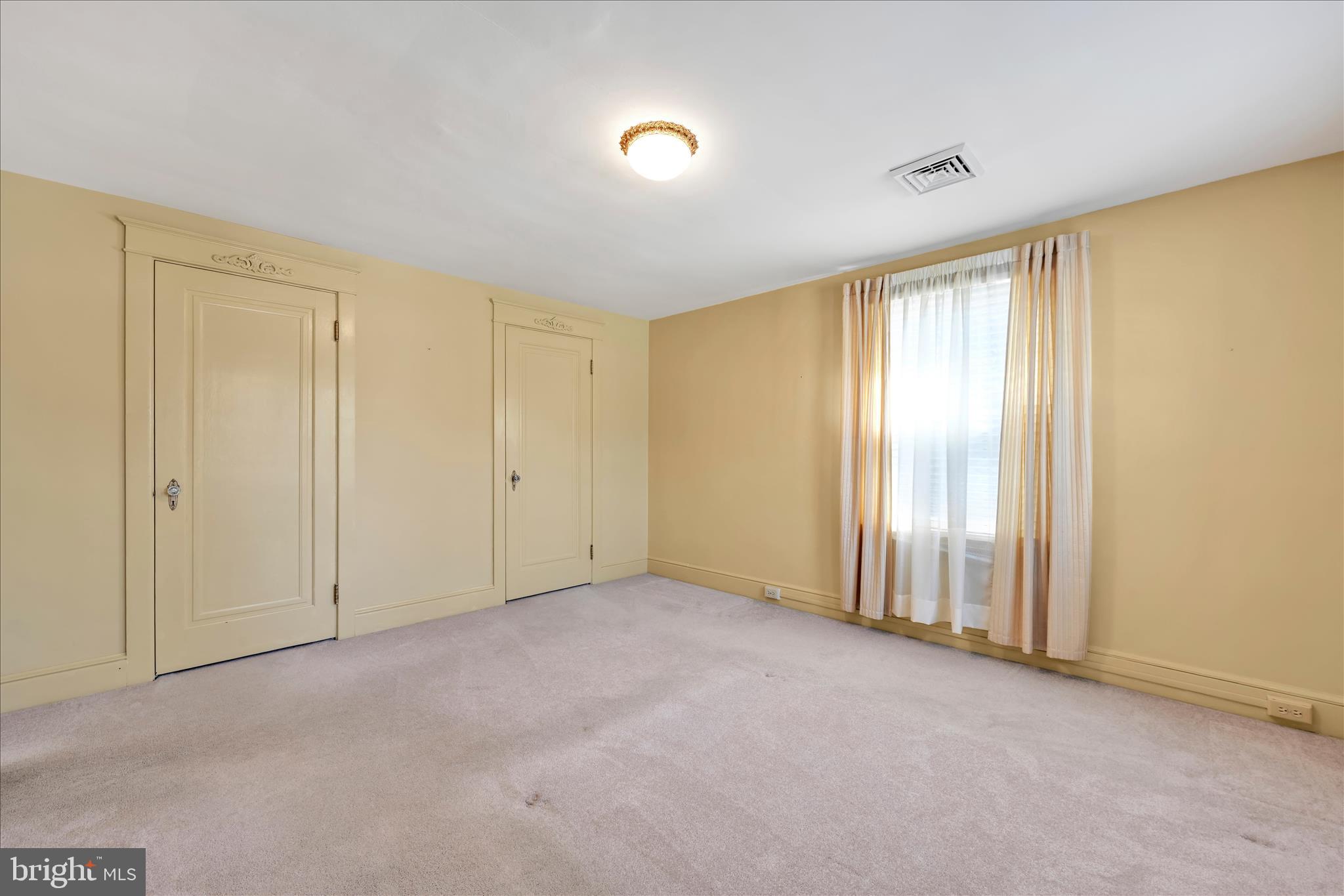 715 South Main Street Red Lion, PA 17356 - Photo 23 of 44 an empty room with windows