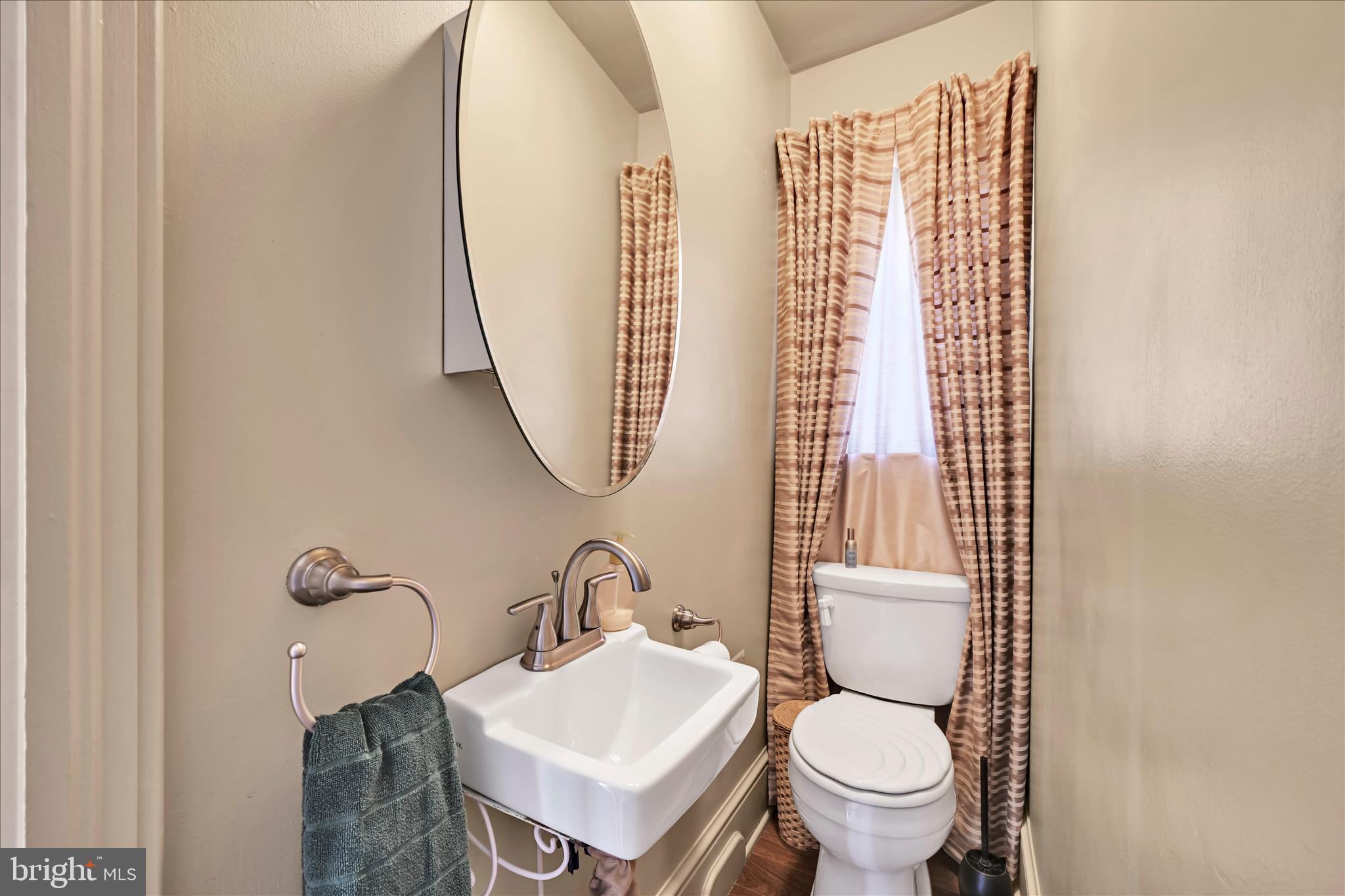 715 South Main Street Red Lion, PA 17356 - Photo 31 of 44 a bathroom with a toilet sink and mirror
