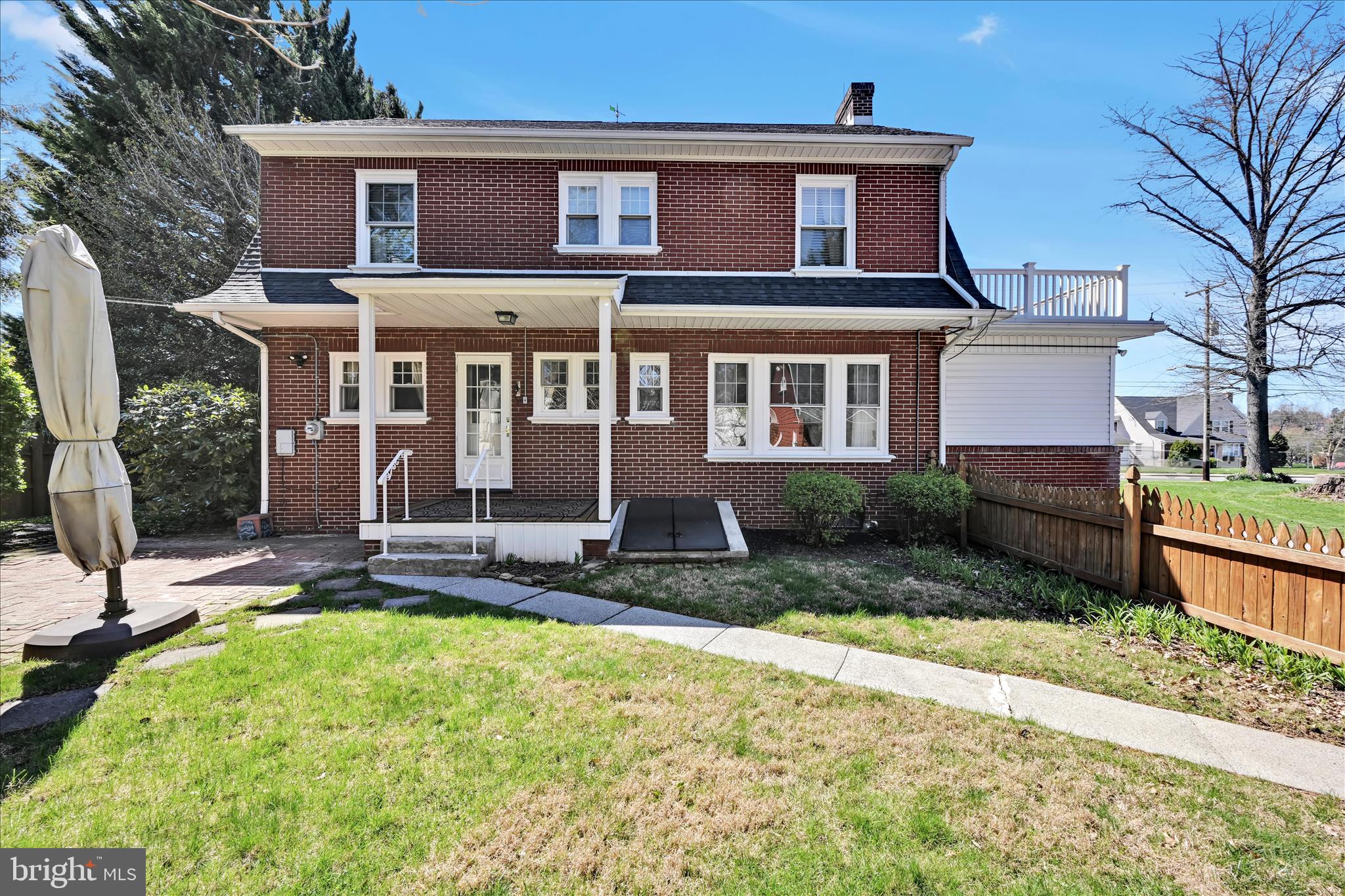 715 South Main Street Red Lion, PA 17356 - Photo 40 of 44 a front view of a house with a yard and garage