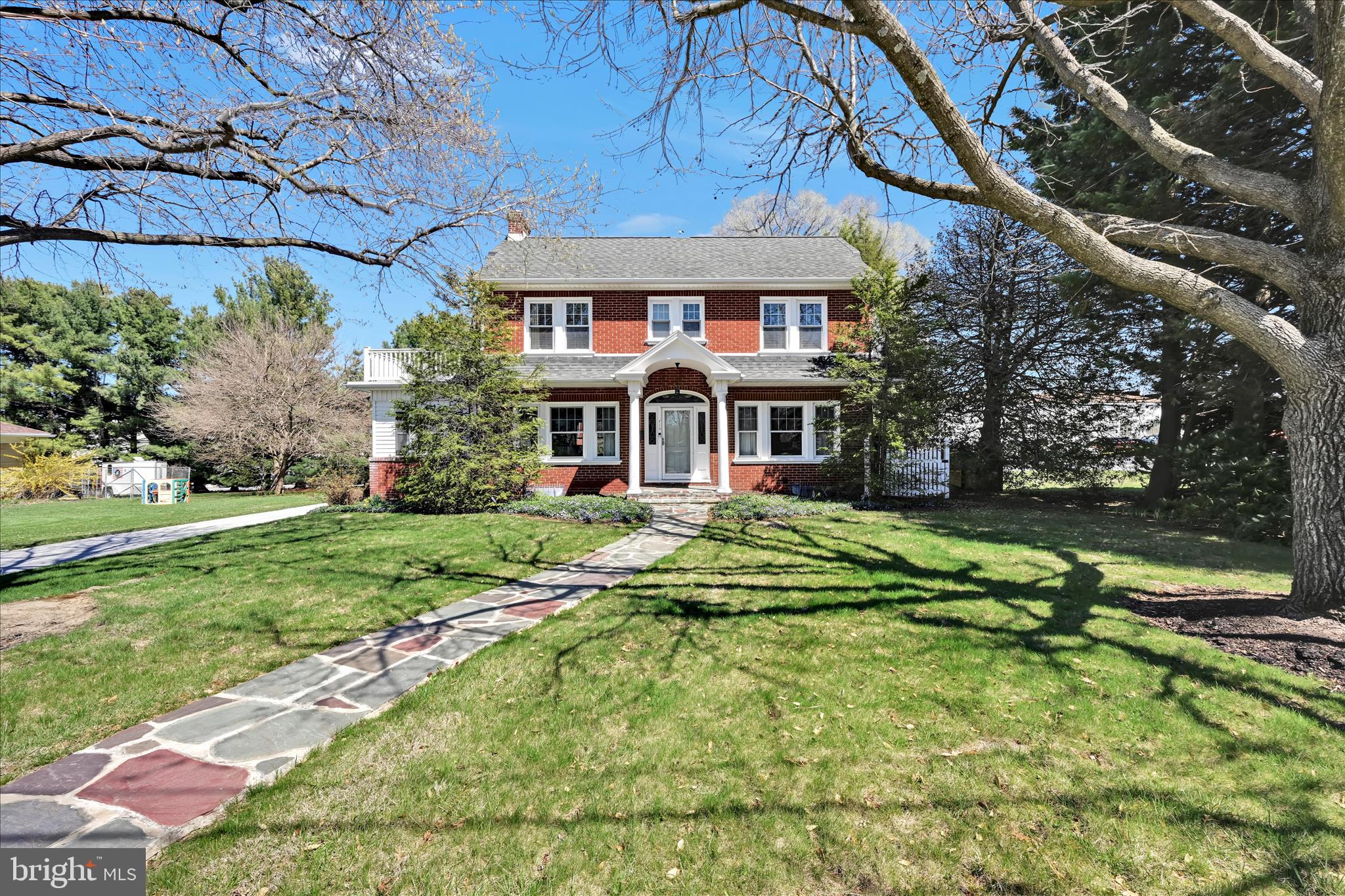 715 South Main Street Red Lion, PA 17356 - Photo 5 of 44 a front view of a house with a yard table and chairs