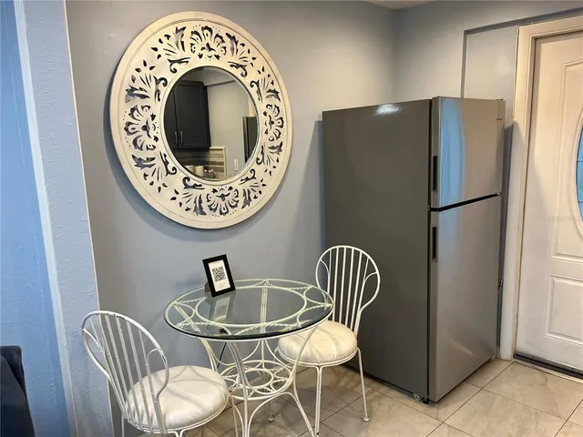 a view of a dinning room with furniture