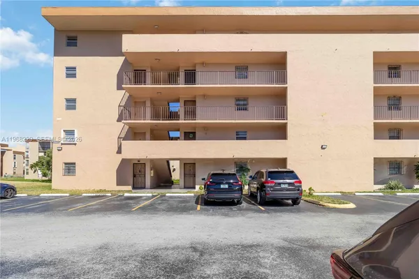 a cars parked in front of a building