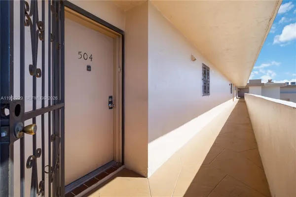 a view of a hallway with the door