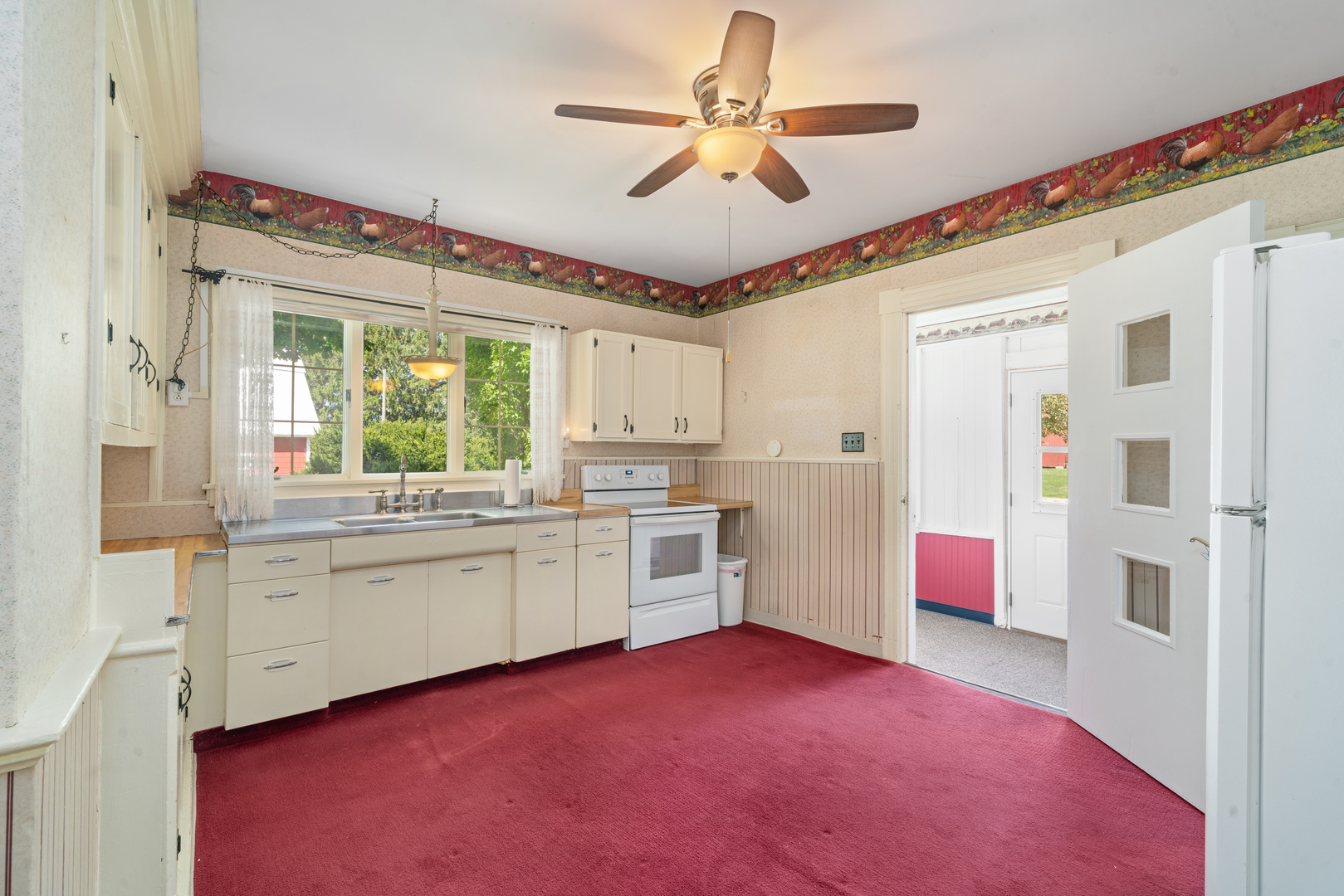 10435 South County Line Road Leland, IL 60531 - Photo 14 of 58 a open kitchen with stainless steel appliances granite countertop a stove cabinets and wooden floor