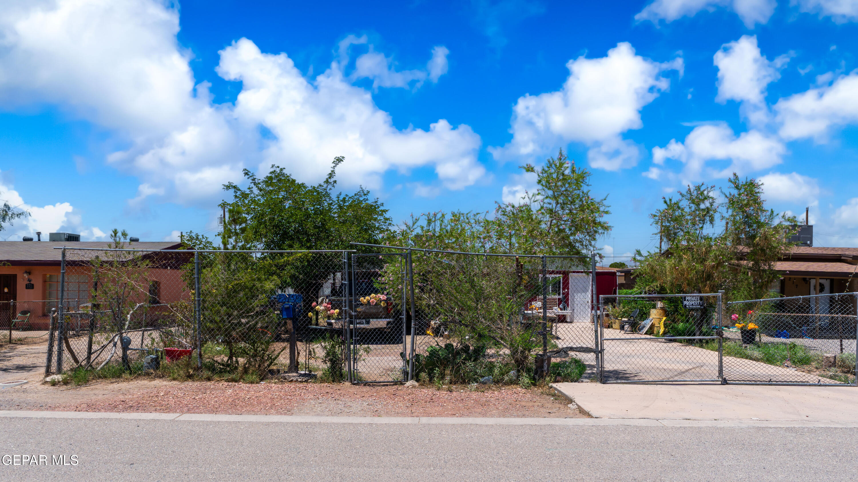 a view of a street with a building in the background