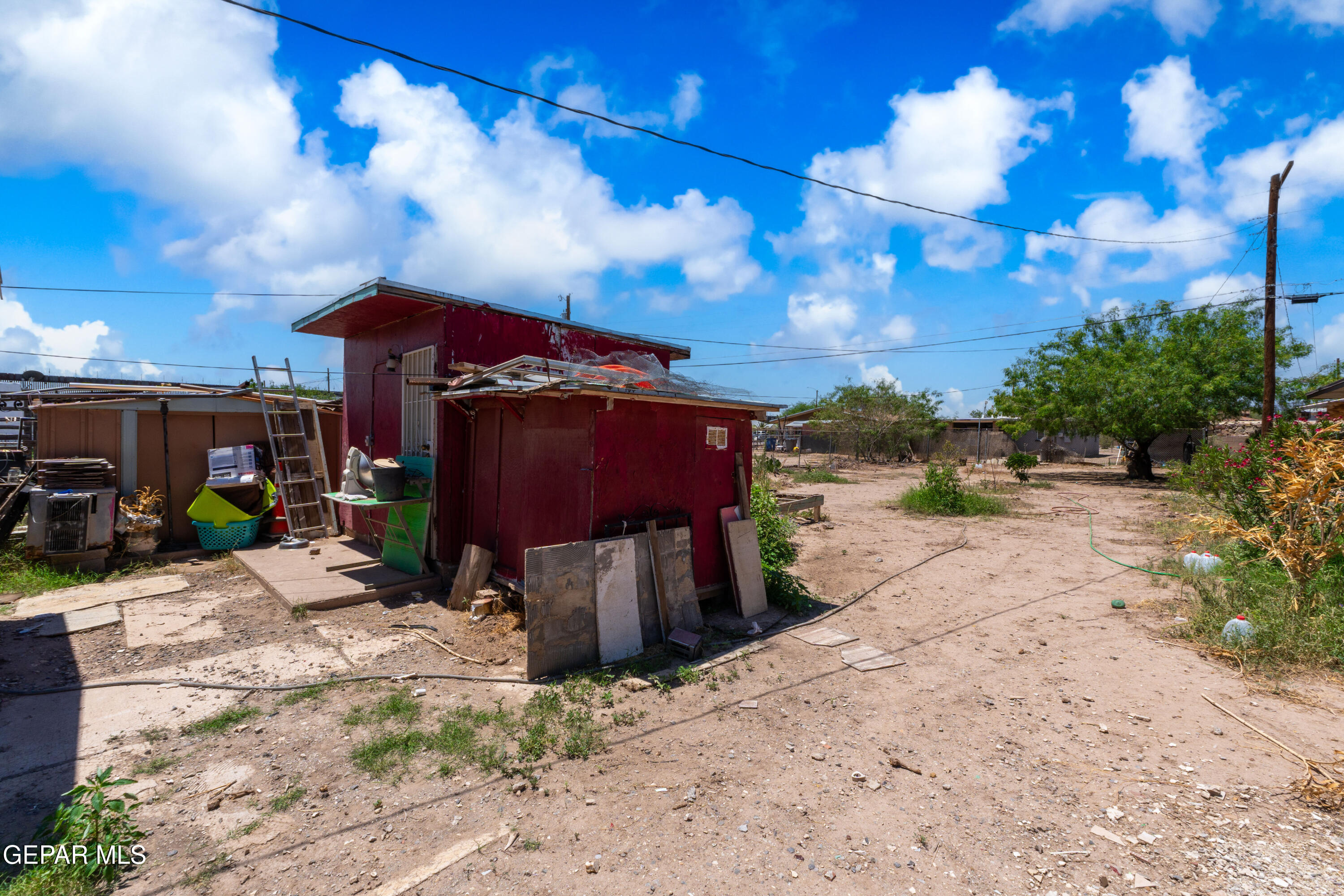 219 Polo Inn Road El Paso, TX 79915 - Photo 18 of 25 a view of a house with a patio