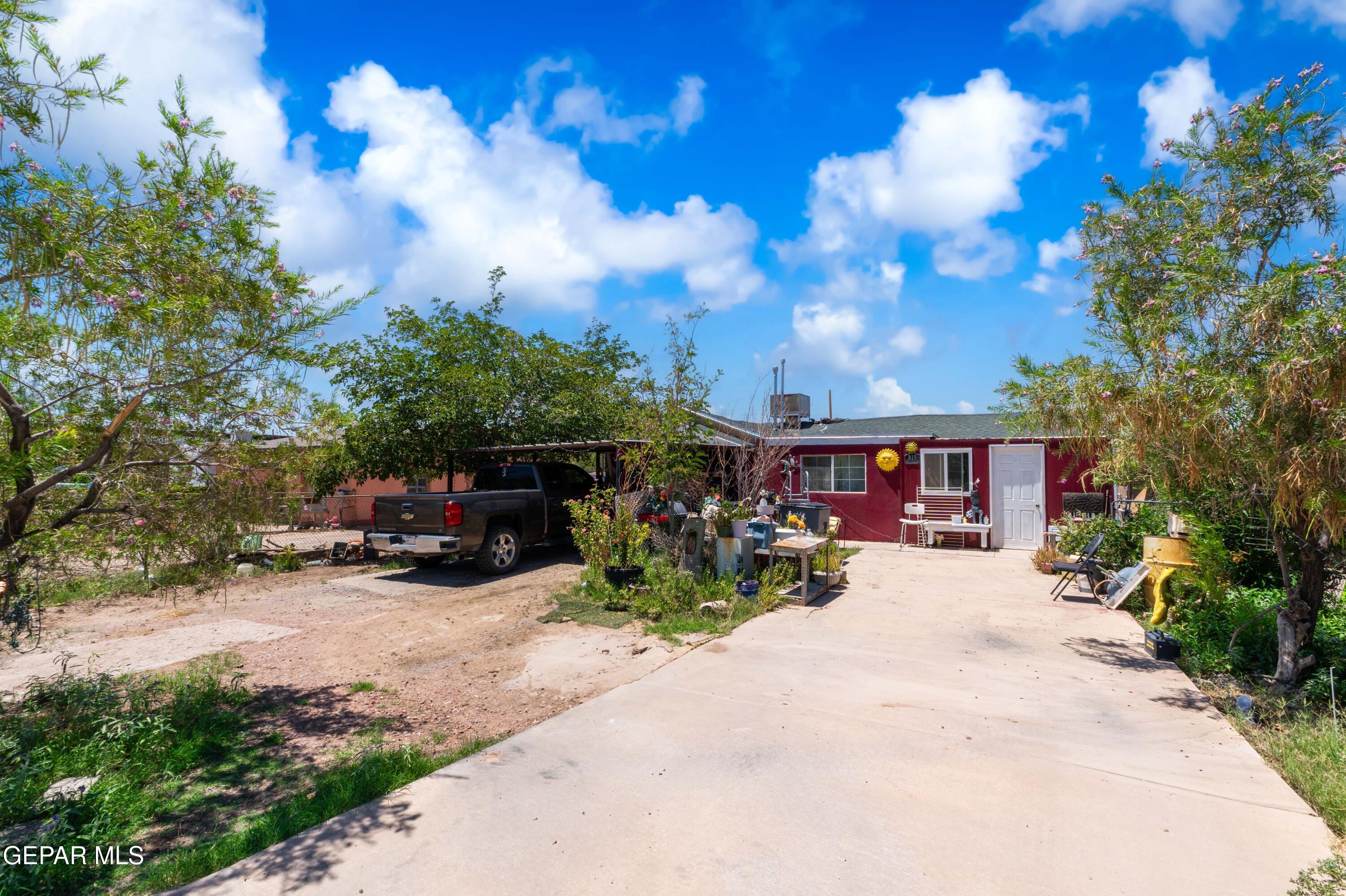 219 Polo Inn Road El Paso, TX 79915 - Photo 2 of 25 a view of a house with sitting area and entertaining space