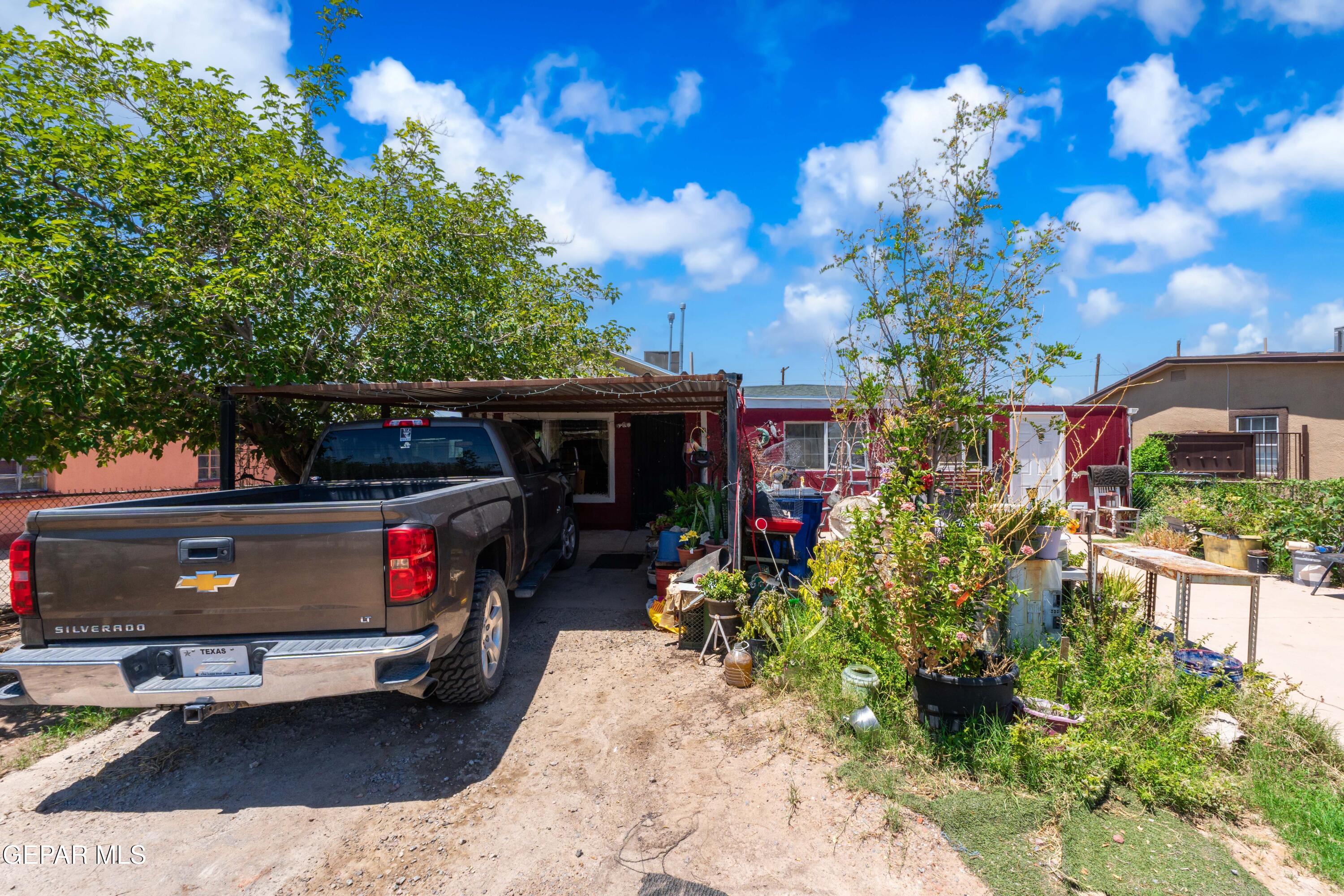 219 Polo Inn Road El Paso, TX 79915 - Photo 3 of 25 a car parked in front of a house