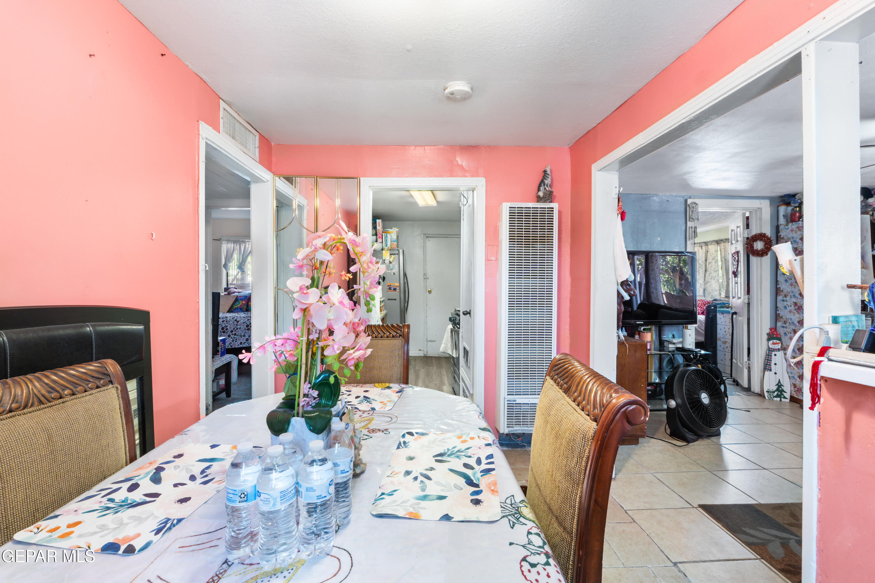 219 Polo Inn Road El Paso, TX 79915 - Photo 9 of 25 a living room with furniture flowerpot and wooden floor