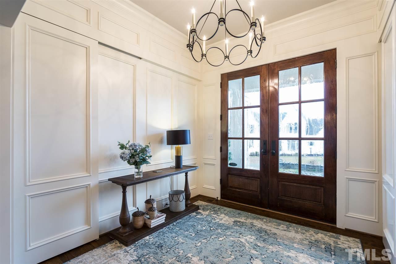5108 Bella Ridge Drive Raleigh, NC 27615 - Photo 4 of 29 Paneled walls grace the entrance.