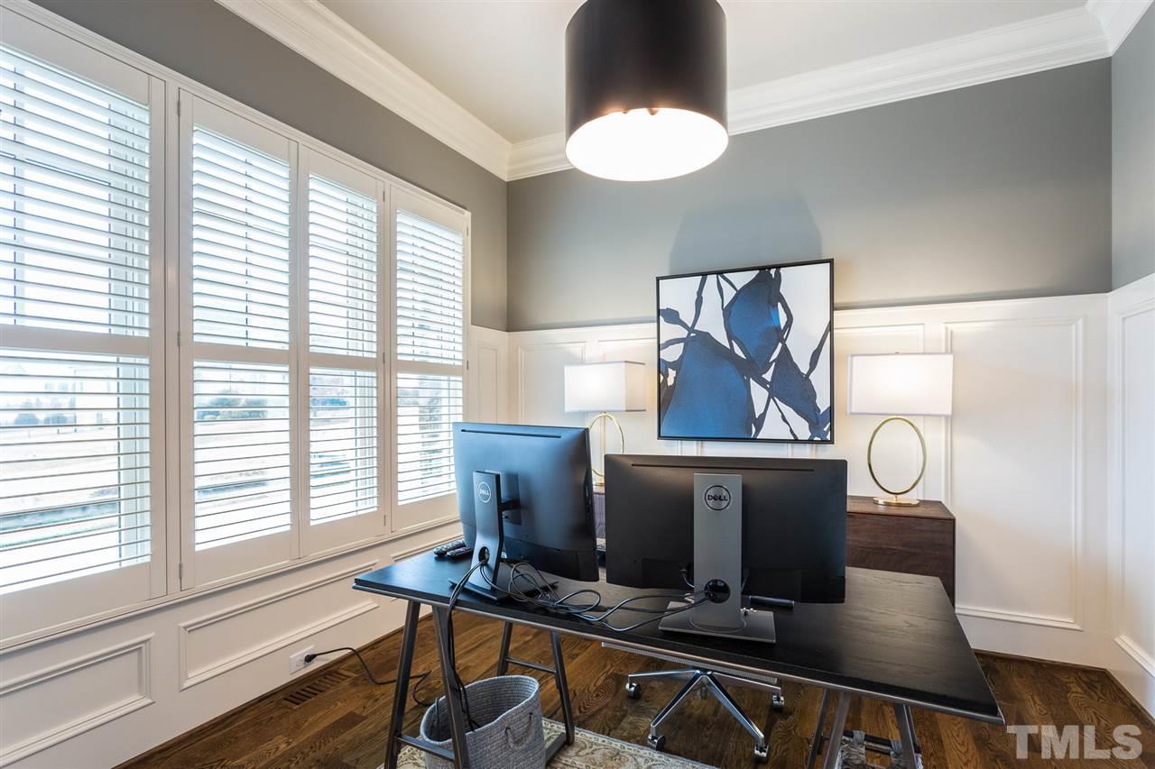 5108 Bella Ridge Drive Raleigh, NC 27615 - Photo 5 of 29 There are 2 offices on the main level. The first office is off the foyer and features custom "barn doors", hardwood floors, and plantation shutters.