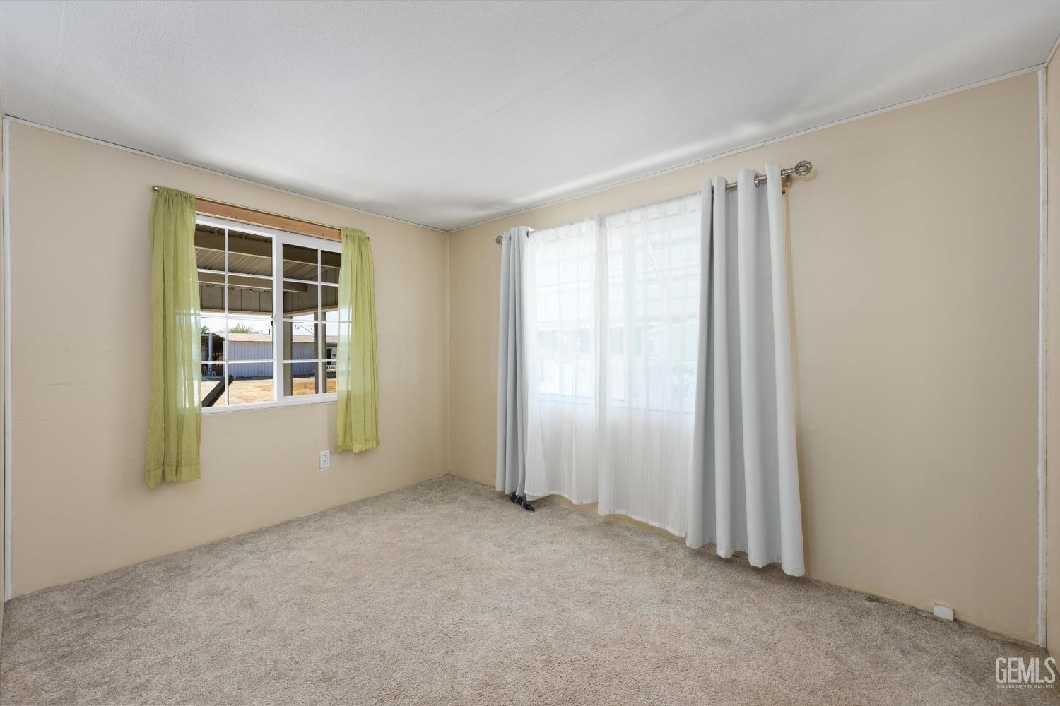 Undisclosed Address Bakersfield, CA 93314 - Photo 18 of 34 an empty room with windows