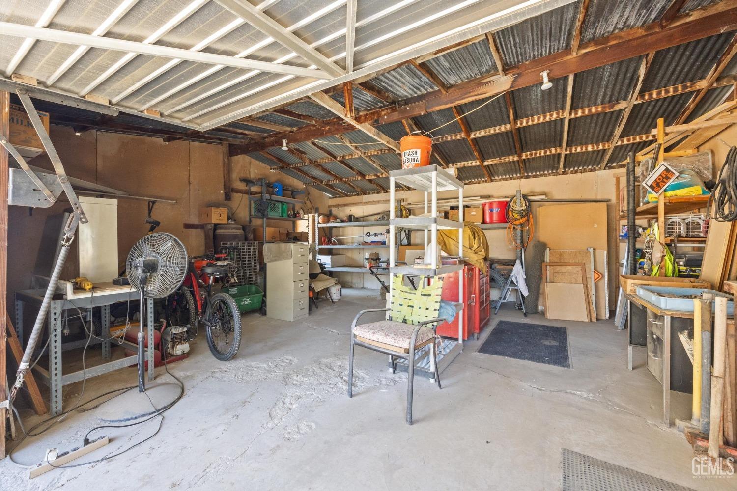 Undisclosed Address Bakersfield, CA 93314 - Photo 31 of 34 a view of a storage room with racks