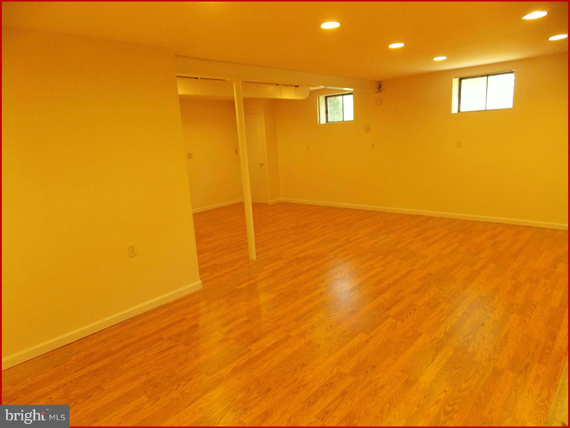 1615 Ladd Street Silver Spring, MD 20902 - Photo 12 of 30 a view of empty room with wooden floor
