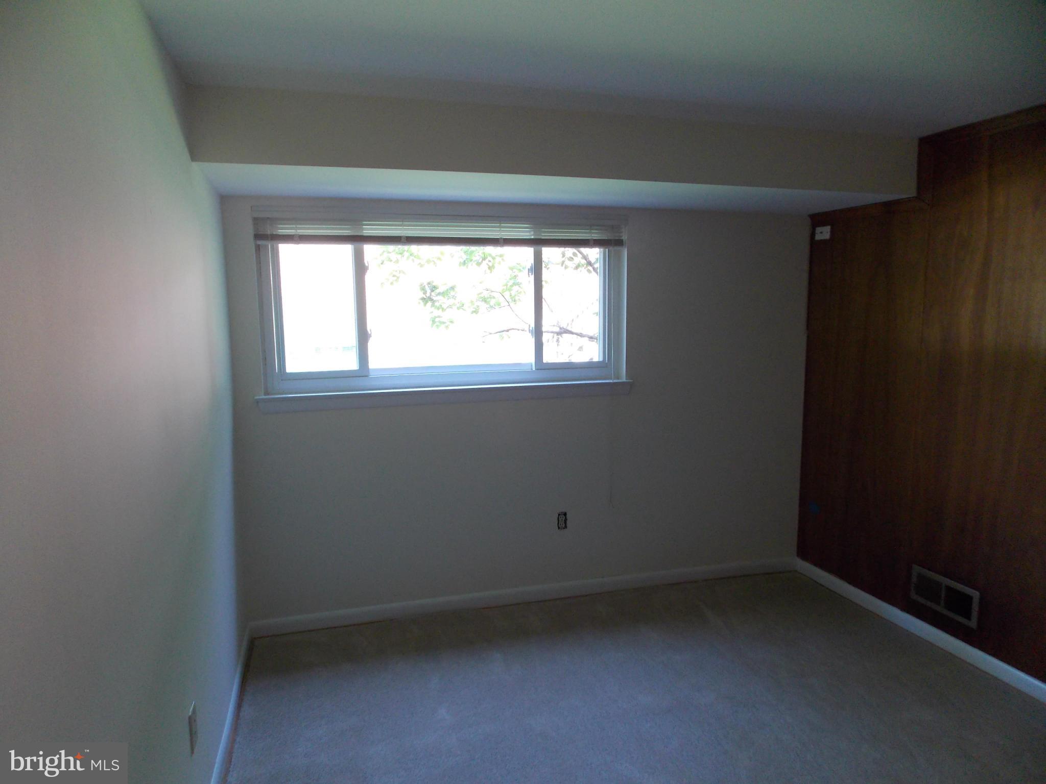 1615 Ladd Street Silver Spring, MD 20902 - Photo 10 of 30 an empty room with a window