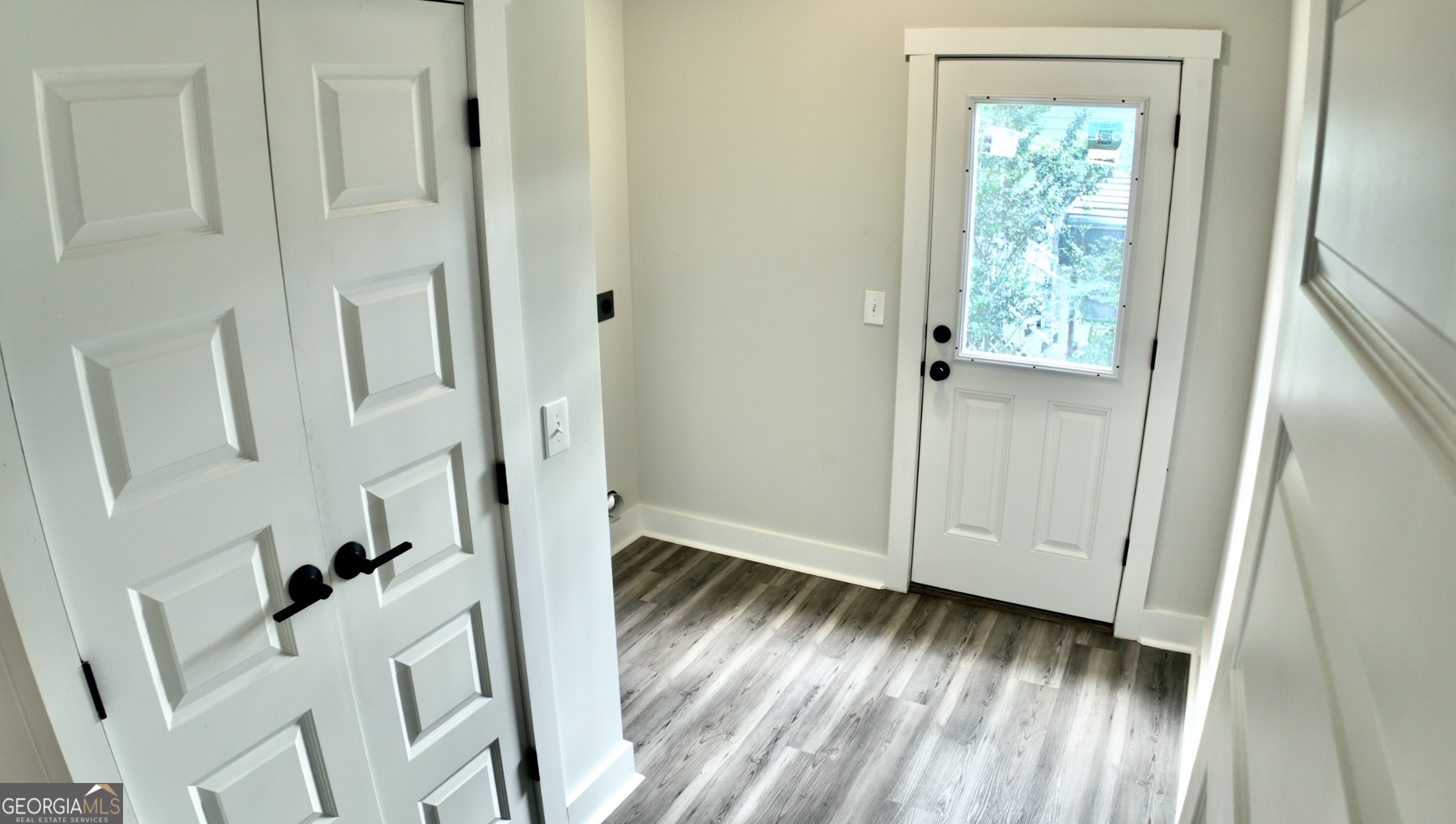 769 Horsley Mill Road Carrollton, GA 30116 - Photo 6 of 7 a view of an entryway with wooden floor