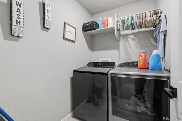 a utility room with closet