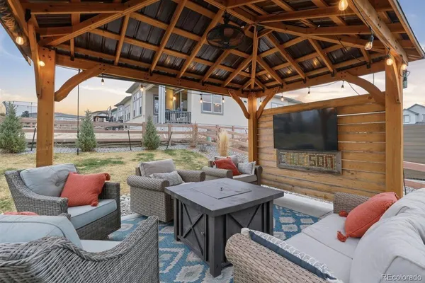 a outdoor living space with furniture and a couch