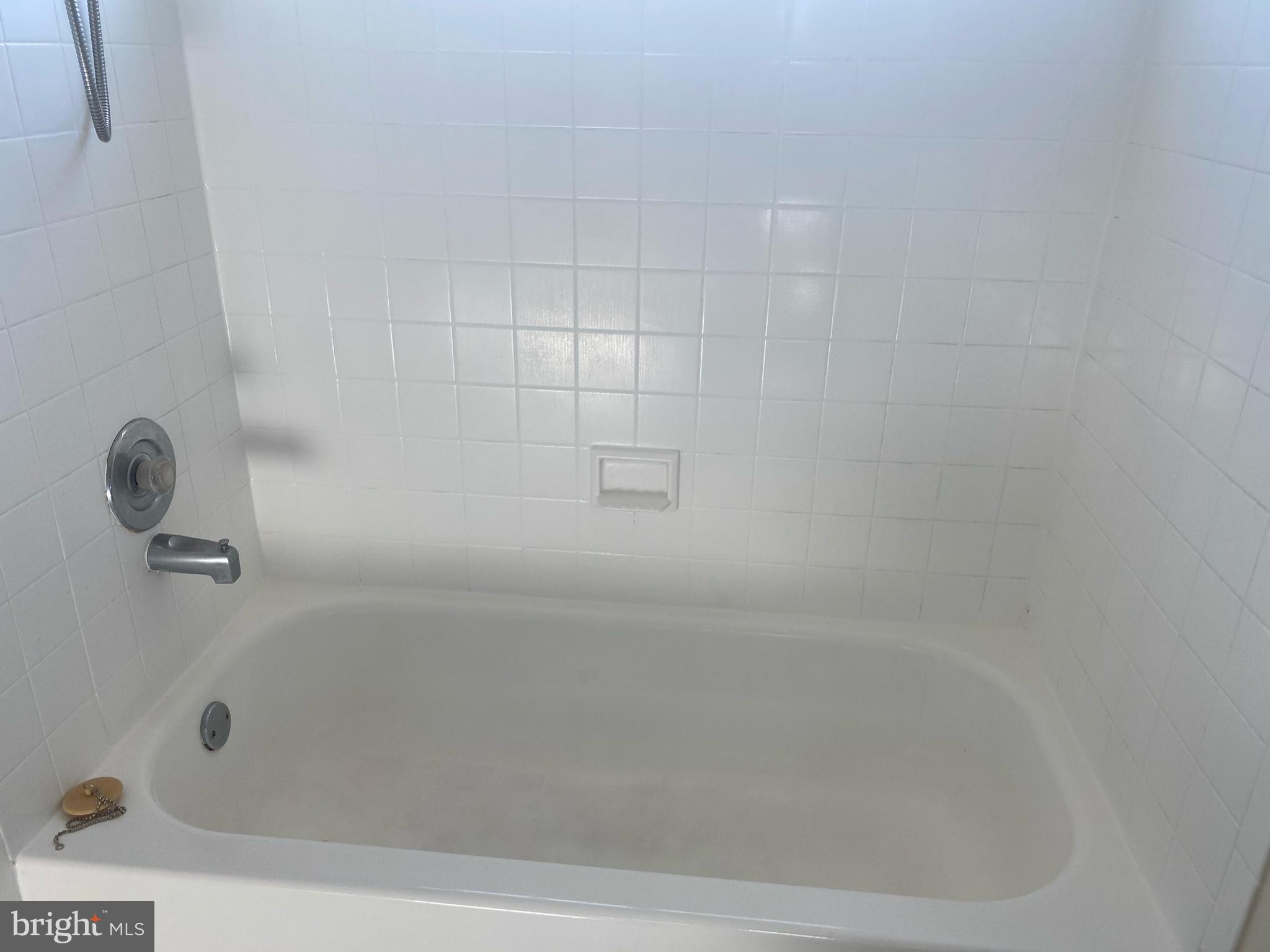 14119 Bowsprit Lane, Unit 312 Laurel, MD 20707 - Photo 18 of 24 a close up of a bathtub
