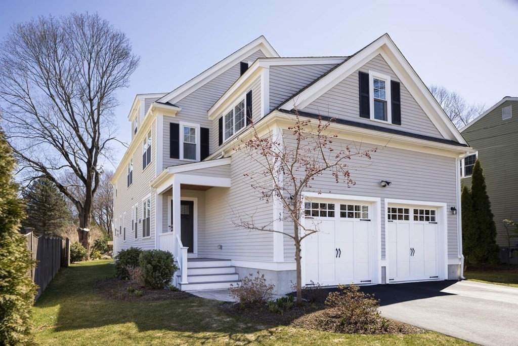 55 Kendall Road Lexington, MA 02421 - Photo 1 of 32 a view of a white house with a large windows