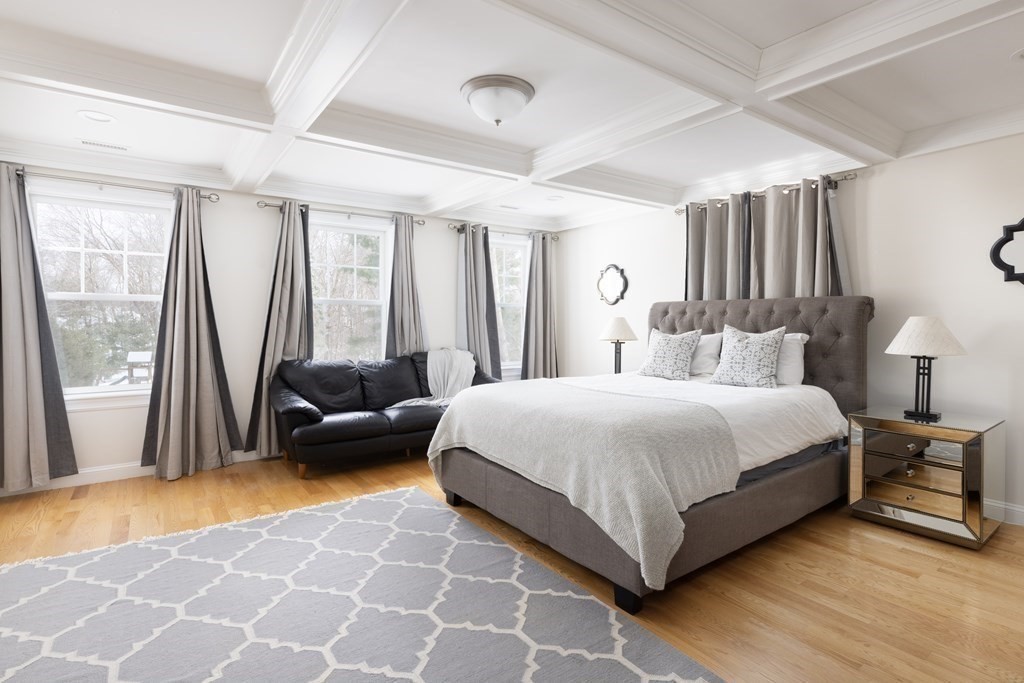 55 Kendall Road Lexington, MA 02421 - Photo 11 of 32 a bedroom with a bed and glass windows