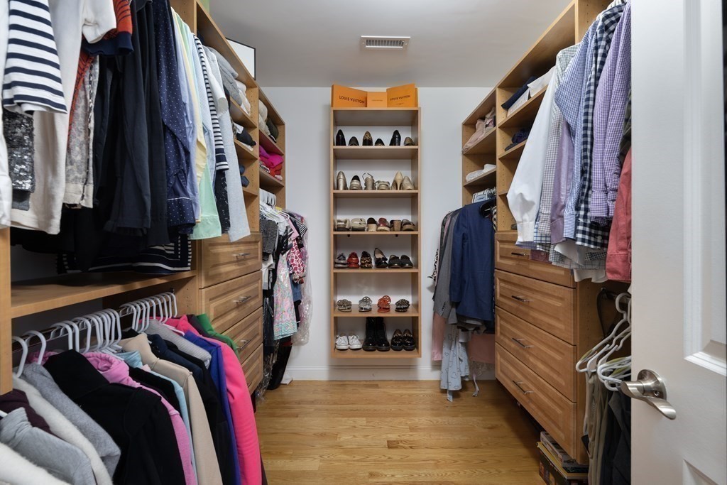 55 Kendall Road Lexington, MA 02421 - Photo 12 of 32 a view of walk in closet with clothes and shoes
