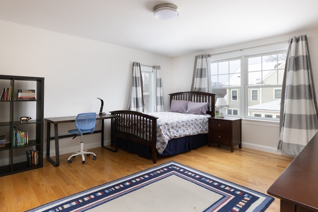 55 Kendall Road Lexington, MA 02421 - Photo 14 of 32 a bedroom with furniture and a window