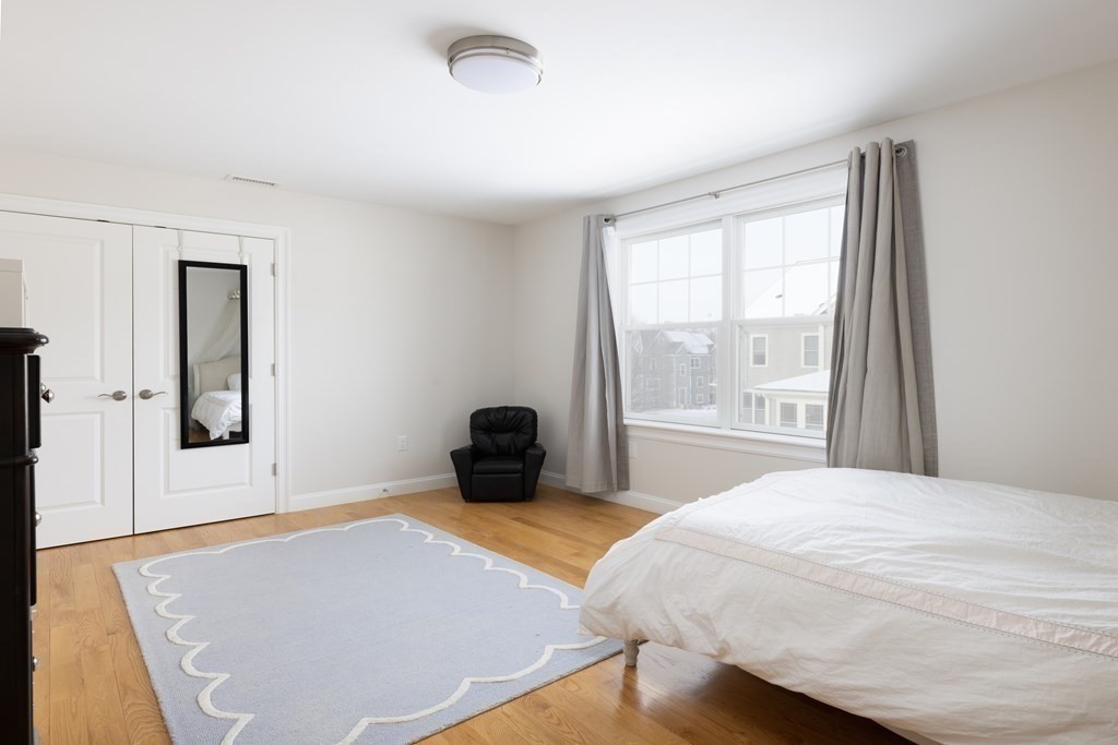 55 Kendall Road Lexington, MA 02421 - Photo 16 of 32 a bedroom with a bed and window