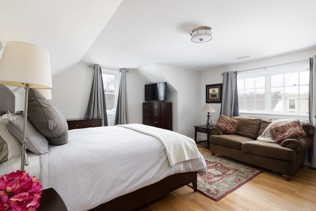 55 Kendall Road Lexington, MA 02421 - Photo 18 of 32 a bedroom with a bed couch and a window