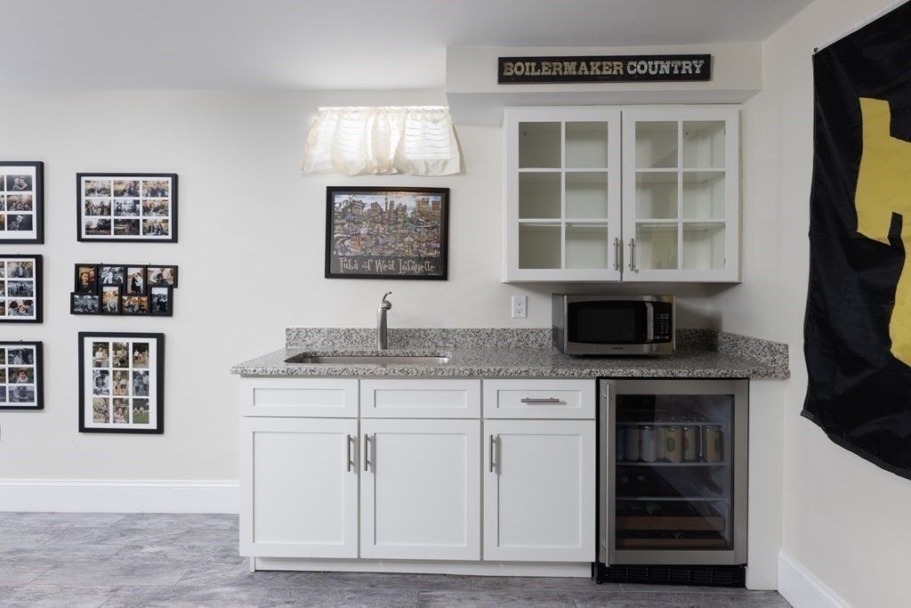 55 Kendall Road Lexington, MA 02421 - Photo 22 of 32 a kitchen with cabinets and window