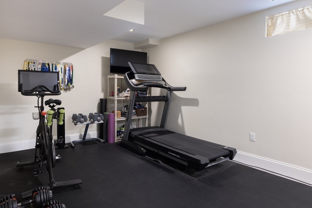 55 Kendall Road Lexington, MA 02421 - Photo 23 of 32 a room with gym equipment