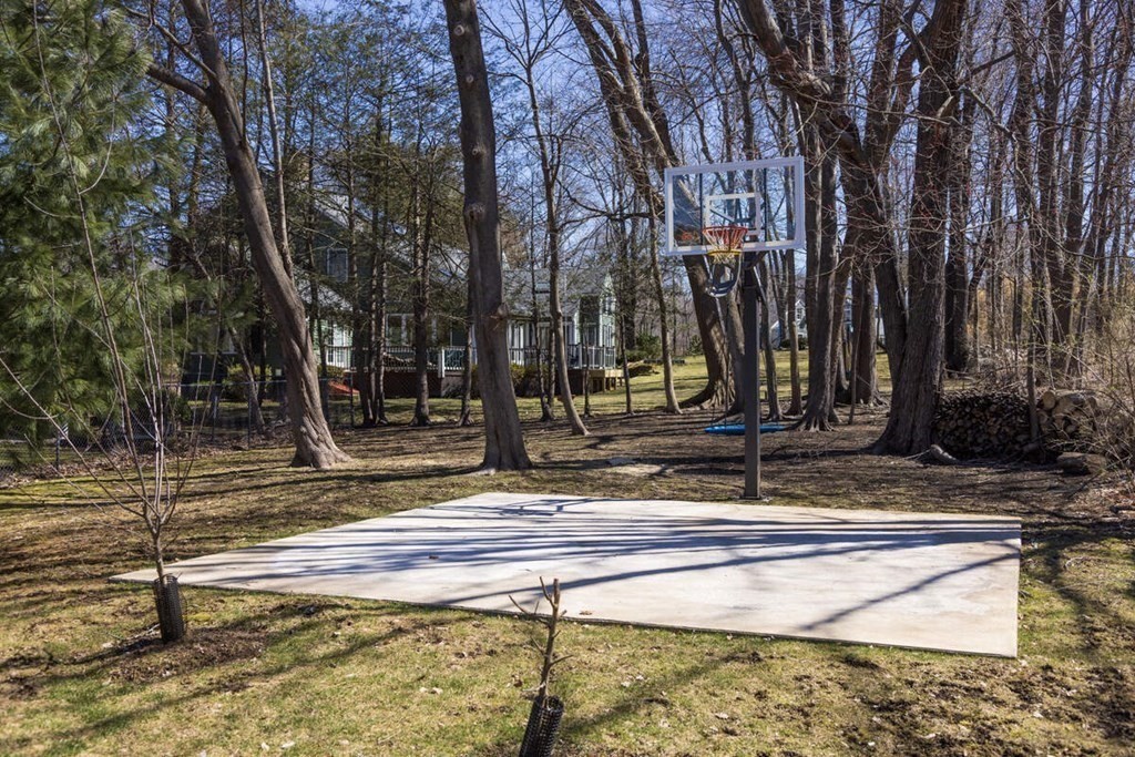 55 Kendall Road Lexington, MA 02421 - Photo 4 of 32 a view of a yard with large trees