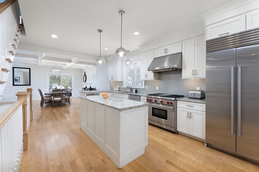55 Kendall Road Lexington, MA 02421 - Photo 5 of 32 a kitchen with stainless steel appliances granite countertop a stove and a refrigerator