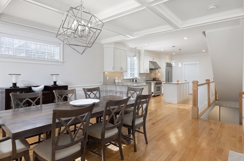 55 Kendall Road Lexington, MA 02421 - Photo 8 of 32 a view of a dining room with furniture a chandelier and wooden floor