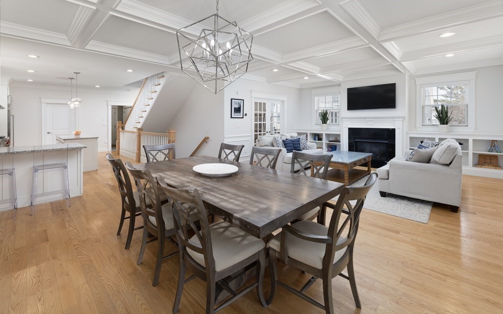 55 Kendall Road Lexington, MA 02421 - Photo 9 of 32 a view of a dining room with furniture wooden floor and a chandelier